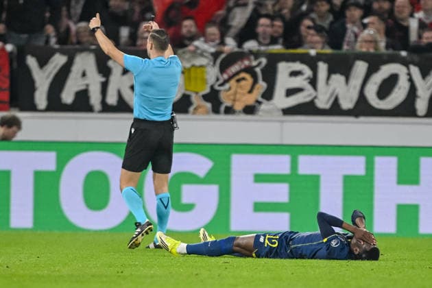 Zaidu FC Porto injured on the ground during the UEFA Europa League 2025 26 Round of 16 First Leg match between VfB Stuttgart and FC Porto at Stuttgart Arena on March 12, 2026 in Stuttgart, Germany Photo by Harry Langer DeFodi Images