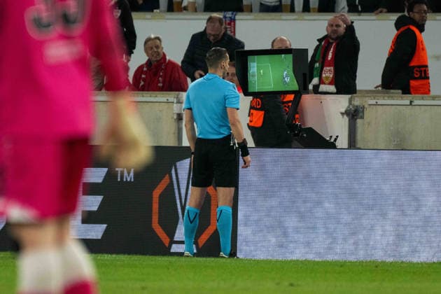 Referee Donatas Rumsas LTU checks if there was offside xettx, Germany, Stuttgart, 12 03 2026, Football, UEFA Europa League VfB Stuttgart vs FC Porto, Season 2025 2026, Round of 16, MHP Arena