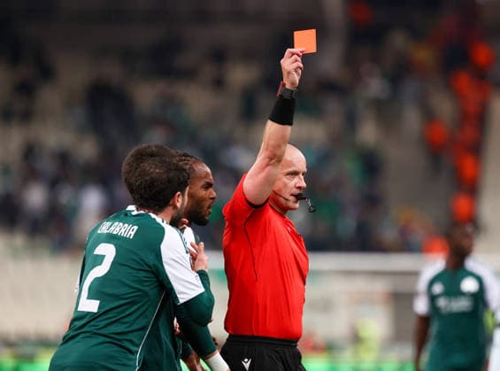 Panathinaikos F.C. v Real Betis UEFA Europa League Match referee Szymon Marciniak shows a red card to Anass Zaroury of Panathinaikos F.C. during the UEFA Europa League Round of 16 First Leg match at the Olympic Stadium (Greece), Marousi 12 03 2026 UK Newspapers OUT Copyright: xYannisxHalasx FIL-23117-0057