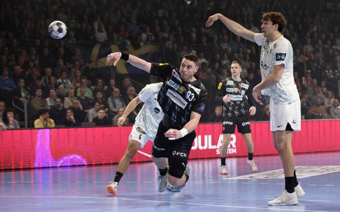 Mijajlo Marsenic scores a goal against goalkeeper Ignacio Biosca duel Match scene Action Sport Handball CL Champions League Champions League Men 14 Matchday Season 2025 2026 12 03 2026 Füchse Berlin vs HBC Nantes in the Max Schmeling Halle