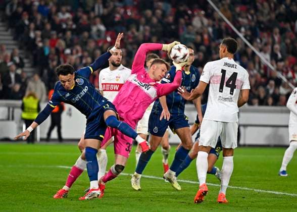 12 03 2026, Football UEFA Europa League 2025 2026 Round of 16, VfB Stuttgart FC Porto, in the MHP Arena Stuttgart, Goalkeeper Alexander Nübel Stuttgart defends the ball Pepe li, FC Porto DFL and DFB regulations prohibit any use of photographs as image sequences and or quasi video
