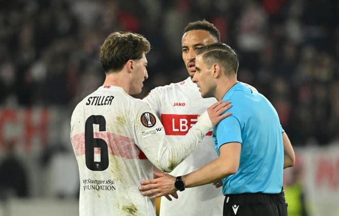 after the end of the match Referee Donatas Rumsas LTU in conversation Discussion with Angelo Stiller VfB Stuttgart 06 Jamie Leweling VfB Stuttgart 18 VfB Stuttgart vs FC Porto EUROPA LEAGUE EL 12 03 2026 DFL REGULATIONS PROHIBIT ANY USE OF PHOTOGRAPHS AS IMAGE SEQUENCES AND OR QUASI VIDEO VfB Stuttgart vs FC Porto
