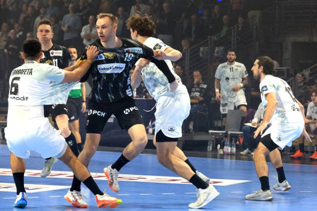 DEU, Machineseeker EHF Champions League, Fuechse Berlin vs HBC Nantes, 12 03 2026, Max Schmeling Halle, Berlin, DEU, Machineseeker EHF Champions League, Fuechse Berlin vs HBC Nantes, in the picture Mathias Gidsel Fuechse Berlin 19 , Ian Tarrafeta HBC Nantes 6 , Thibaud Briet HBC Nantes 3 nordphotoxGmbHx xEngler nph00076