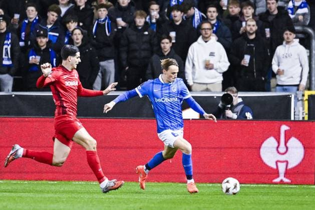 Freiburg s Igor Matanovic and Genk s Matte Smets pictured in action during a game between Belgian soccer team KRC Genk and German Freiburg, Thursday 12 March 2026 in Genk, the first leg of the 1 16 Finals of the UEFA Europa League tournament. TOM GOYVAERTS TomxGoyvaerts  x167296457x