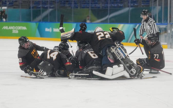 March 12, 2026, Milan, Milano, Italy: Germany s para Ice hockey, Eishockey team celebrating after winning over Slovakia in the Para Ice Hockey Classification Game at Milano Santagiulia Ice Hockey Arena during Paralympic Winter games, Winterspiele,Spiele, Summer games in Milano, Italy. Milan Italy - ZUMAk197 20260312_zsp_k197_016 Copyright: xRanjithxKumarx