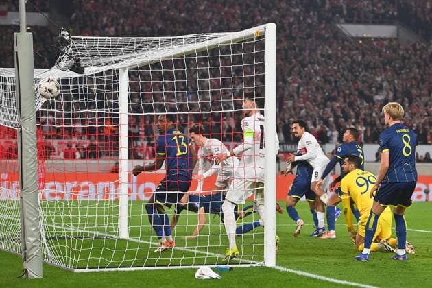 Irregular goal by Angelo STILLER VFB Stuttgart,hi for 2 2,handball penalty area action Football UEFA Europa League round of 16 VfB Stuttgart FC Porto 1 2 on 12 03 2026 MHP ARENA