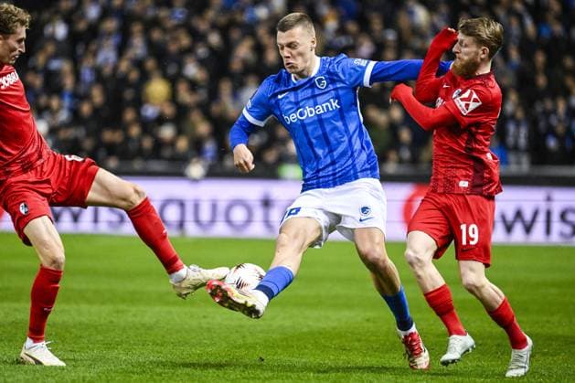 Genk s Daan Heymans and Freiburg s Niklas Beste pictured in action during a game between Belgian soccer team KRC Genk and German Freiburg, Thursday 12 March 2026 in Genk, the first leg of the 1 16 Finals of the UEFA Europa League tournament. TOM GOYVAERTS TomxGoyvaerts  x167296722x