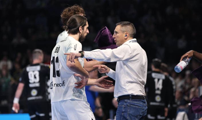 Coach Gregory Cojean talks to Julien Bos Action upper body Sport Handball CL Champions League Champions League Men 14 Matchday Season 2025 2026 12 03 2026 Füchse Berlin vs HBC Nantes in the Max Schmeling Halle