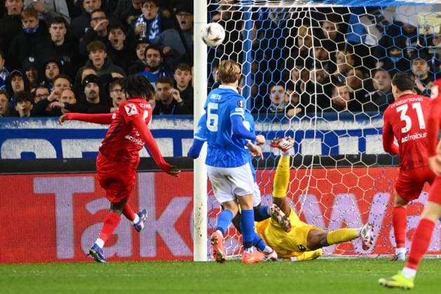 KRC Genk v Freiburg - UEFA Europa League GENK, BELGIUM - MARCH 12 : Johan Manzambi midfielder of Freiburg scores a goal, Lawal Tobias goalkeeper of KRC Genk during the UEFA Europa League 2025 26 round of 16 match first leg between KRC Genk and Freiburg on March 12, 2026 in Genk, Belgium, 12 03 2026 Genk Belgium  Copyright: xVincentxKalutx