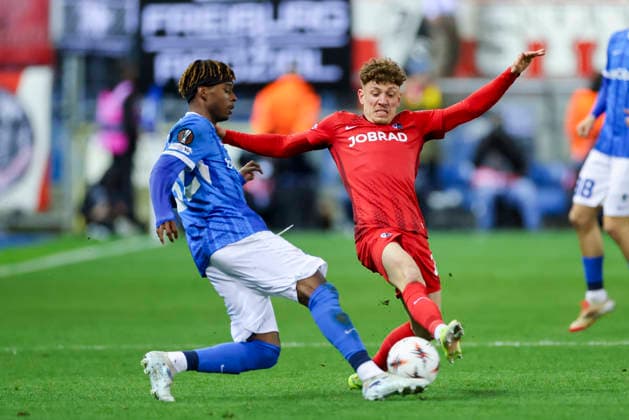 Noah Adedeji Sternberg KRC Genk and Philipp Treu SC Freiburg battle for the ball, UEFA Europa League 2025 26 Round of 16 First Leg, KRC Genk v SC Freiburg, Cegeka Arena on March 12, 2026 in Genk, Belgium Photo by Marco Steinbrenner DeFodi Images Noah Adedeji Sternberg KRC Genk and Philipp Treu SC Freiburg battle for the ball, UEFA Europa League 2025 26 Round of 16 First Leg, KRC Genk v SC Freiburg, Cegeka Arena, March 12, 2026 in Genk, Belgium Photo by Marco Steinbrenner DeFodi Images