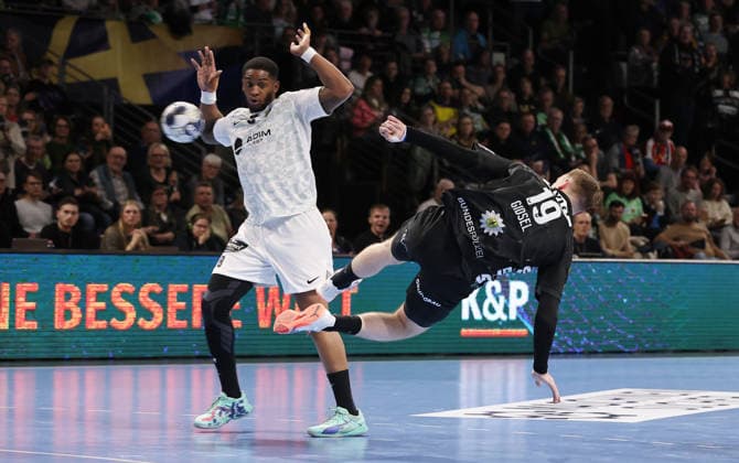 O Brien Nyateu, Mathias Gidsel throws over the backhand duel Game scene Action Sport Handball CL Champions League Champions League Men 14 Matchday Season 2025 2026 12 03 2026 Füchse Berlin vs HBC Nantes in the Max Schmeling Halle