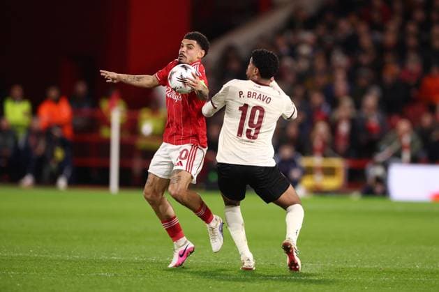 Morgan Gibbs-White of Nottingham Forest and Pedro Bravo of FC Midtjylland Nottingham Forest v FC Midtjylland, UEFA Europa League, Round of 16, First Leg, Football, City Ground, Nottingham, UK - 12 Mar 2026Nottingham City Ground United Kingdom EDITORIAL USE ONLY No use with unauthorised audio, video, data, fixture lists, club league logos or live services. Online in-match use limited to 120 images, no video emulation. No use in betting, games or single club league player publications. Copyright: xRyanxBrowne Shutterstockx 16746750z