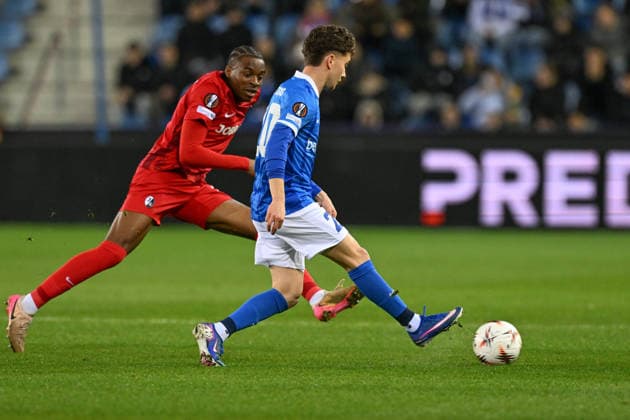 260312 KRC Genk vs SC Freiburg Konstantinos Karetsas (20) of Genk pictured pictured during the first leg game in the Uefa Europa League season 2025-2026 round of 16 between KRC Genk and SC Freiburg from Germany on March 12 , 2026 in Genk, Belgium. (Photo by David Catry Isosport) Genk Belgium  Copyright: xDavidxCatryx 20260312DC2_1194