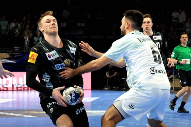 DEU, Machineseeker EHF Champions League, Fuechse Berlin vs HBC Nantes, 12 03 2026, Max Schmeling Halle, Berlin, DEU, Machineseeker EHF Champions League, Fuechse Berlin vs HBC Nantes, in the picture Mathias Gidsel Fuechse Berlin 19 , Ian Tarrafeta HBC Nantes 6 nordphotoxGmbHx xEngler nph00076