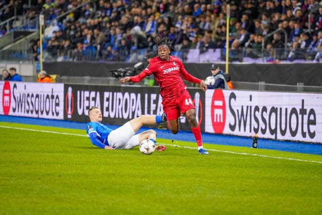 Belgium Football Europa League 2025 2026, Round of 16 KRC Genk vs SC Freiburg Cegeka Arena Genk Johan Manzambi SC Freiburg, 44 Sponsors, Advertising, Economy, Advertising board, Equipment Swissquote Jobrad Copyright: xJOERANxSTEINSIEKx