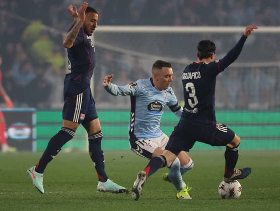 ESP: Real Celta v Olympique Lyonnais, EuropaLeague, 12 March 2026 Iago Aspas of Real Club Celta de Vigo and Nicolas Tagliafico of Olympique Lyonnais in action during the UEFA Europe League KO poff, 2st leg between Real Club Celta de Vigo and Olympique Lyonnais at Stadium Municipal ABANCA Balaidos on March 12,2026 in Vigo (Spain) (Photo by Luis de la Mata SportPix Sipa USA Vigo Stadium Municipal Balaidos ABANC Galicia Spain Copyright: xLuisxdexlaxMatax xsportPix.org.ux