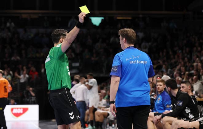 Yellow card for coach Nicolej Krickau Upper body action Sport Handball CL Champions League Champions League Men 14 Matchday Season 2025 2026 12 03 2026 Füchse Berlin vs HBC Nantes in the Max Schmeling Halle