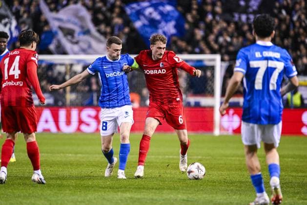 Genk s Bryan Heynen and Freiburg s Patrick Osterhage pictured in action during a game between Belgian soccer team KRC Genk and German Freiburg, Thursday 12 March 2026 in Genk, the first leg of the 1 16 Finals of the UEFA Europa League tournament. TOM GOYVAERTS TomxGoyvaerts  x167304292x