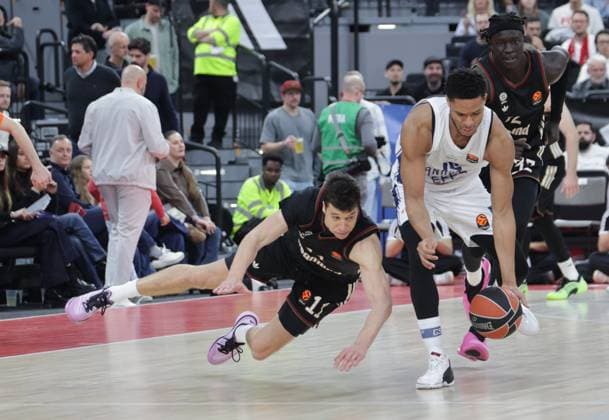 Bayerns 11 Vladimir LUCIC vs Istanbuls 15 DOZIER JR Basketball Bayern Efes Istanbul Euroleague, FC Bayern Basketball Anadolu Efes Istanbul, Round 31, Season 2025 2026, on 12 03 2026 in Munich, S A P G A R D E N, Germany Source Copyright Credit Oryk HAIST xBASKETBALL-BAYERN-EFESx