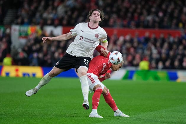 Mads Bech Sorensen of FC Midtjylland and Omari Hutchinson of Nottingham Forest seen in action during the UEFA Europa league football match between Nottingham Forest and FC Midtjylland at City Ground in Nottingham. Copyright: xPaulxBonserx xSportsxPressxPhotox Sportspressphoto_SPR108534