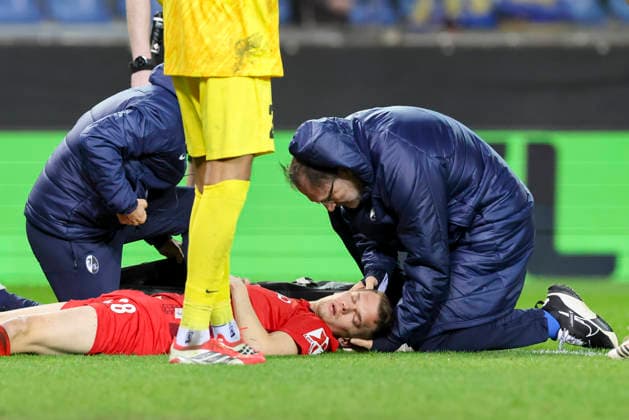 Matthias Ginter SC Freiburg is lying injured on the pitch and is being treated for a head injury, UEFA Europa League 2025 26 Round of 16 First Leg, KRC Genk v SC Freiburg, Cegeka Arena on 12 March 2026 in Genk, Belgium Photo by Marco Steinbrenner DeFodi Images Matthias Ginter SC Freiburg is lying injured on the pitch and is being treated for a head injury, UEFA Europa League 2025 26 Round of 16 First Leg, KRC Genk v SC Freiburg, Cegeka Arena, March 12, 2026 in Genk, Belgium Photo by Marco Steinbrenner DeFodi Images