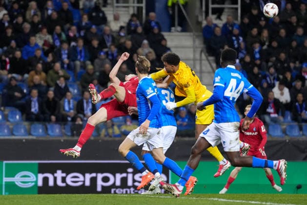 Tobias Lawal KRC Genk, 26 hits Matthias Ginter SC Freiburg, 28 in the penalty area , Belgium, Football, UEFA Europa League, Round of 16 first leg, 2025 2026, KRC Genk vs SC Freiburg, 12 03 2026, KRC Genk Arena, Cegeka Arena, Genk, Belgium Genk KRC Genk Arena, Cegeka Arena Limburg Belgium Copyright: xArnexAmbergx