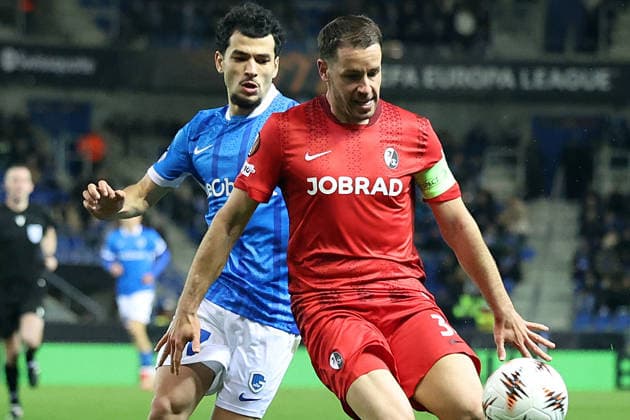 12 03 2026, xrekx, Football UEFA Europa League, KRC Genk SC Freiburg v l Zakaria El Ouahdi KRC Genk Christian Günter Guenter SC Freiburg Zweikampf, Aktion, action, battle for the ball DFL DFB REGULATIONS PROHIBIT ANY USE OF PHOTOGRAPHS as IMAGE SEQUENCES and or QUASI VIDEO Genk