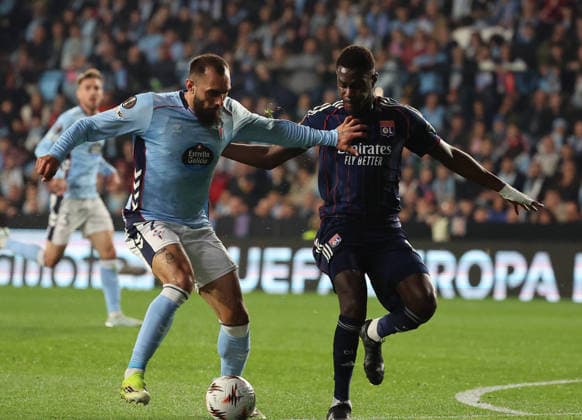 ESP: Real Celta v Olympique Lyonnais, EuropaLeague, 12 March 2026 Borja Iglesias of Real Club Celta de Vigo and Moussa Niakhate of Olympique Lyonnais in action during the UEFA Europe League KO poff, 2st leg between Real Club Celta de Vigo and Olympique Lyonnais at Stadium Municipal ABANCA Balaidos on March 12,2026 in Vigo (Spain) (Photo by Luis de la Mata SportPix Sipa USA Vigo Stadium Municipal Balaidos ABANC Galicia Spain Copyright: xLuisxdexlaxMatax xsportPix.org.ux