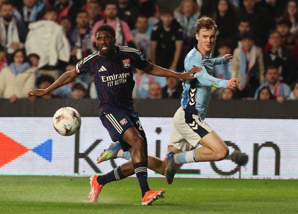 ESP: Real Celta v Olympique Lyonnais, EuropaLeague, 12 March 2026 Clinton Mata of Olympique Lyonnais and Wiliot Swedberg of Real Club Celta de Vigoin action during the UEFA Europe League KO poff, 2st leg between Real Club Celta de Vigo and Olympique Lyonnais at Stadium Municipal ABANCA Balaidos on March 12,2026 in Vigo (Spain) (Photo by Luis de la Mata SportPix Sipa USA Vigo Stadium Municipal Balaidos ABANC Galicia Spain Copyright: xLuisxdexlaxMatax xsportPix.org.ux