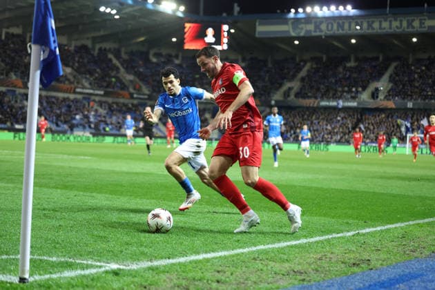 12 03 2026, xrekx, Football UEFA Europa League, KRC Genk SC Freiburg v l Zakaria El Ouahdi KRC Genk Christian Günter Guenter SC Freiburg Zweikampf, Aktion, action, battle for the ball DFL DFB REGULATIONS PROHIBIT ANY USE OF PHOTOGRAPHS as IMAGE SEQUENCES and or QUASI VIDEO Genk