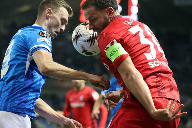 12 03 2026, xrekx, Football UEFA Europa League, KRC Genk SC Freiburg v l Bryan Heynen KRC Genk Christian Günter Guenter SC Freiburg Zweikampf, Aktion, action, battle for the ball DFL DFB REGULATIONS PROHIBIT ANY USE OF PHOTOGRAPHS as IMAGE SEQUENCES and or QUASI VIDEO Genk