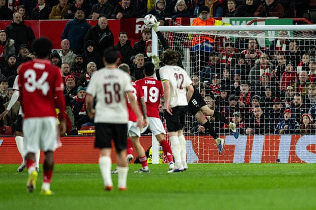 12th March 2026; The City Ground, Nottingham, England; UEFA Europa League Football, Nottingham Forest versus Midtjylland; Elias Rafn Olafsson of FC Midtjylland makes a diving save from the shot from Elliot Anderson of Nottingham Forest  GodfreyxPitt Content restricted for UK based newspaper