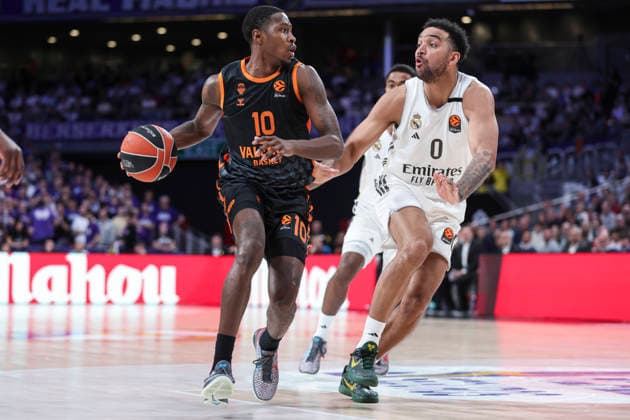 March 12, 2026, Madrid, Madrid, Spain: Omari Moore of Valencia Basket and Trey Lyles of Real Madrid in action during the Turkish Airlines EuroLeague match between Real Madrid and Valencia Basket at Movistar Arena on March 12, 2026 in Madrid, Spain. Real Madrid V Valencia Basket - Turkish Airlines EuroLeague  - ZUMAa181 20260312_zaa_a181_121 Copyright: xIrinaxR.xHipolitox