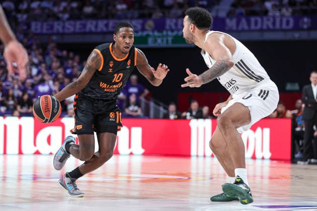 March 12, 2026, Madrid, Madrid, Spain: Omari Moore of Valencia Basket and Trey Lyles of Real Madrid in action during the Turkish Airlines EuroLeague match between Real Madrid and Valencia Basket at Movistar Arena on March 12, 2026 in Madrid, Spain. Real Madrid V Valencia Basket - Turkish Airlines EuroLeague  - ZUMAa181 20260312_zaa_a181_125 Copyright: xIrinaxR.xHipolitox