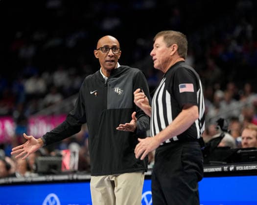 MAR 12 2026: UCF Head Coach Johnny Dawkins questions a blocking call in the Big 12 Championship Tournament at T-Mobile center, Kansas City, Missouri. CSM. Kansas City United States - ZUMAc04_ 20260312_zma_c04_109 Copyright: xJonxRobichaudx