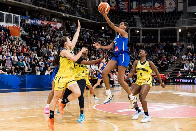 LYON-VILLEURBANNE, FRANCE - MARCH 12: Valeriane Ayayi (France, 11) shoots the ball over Manuela Rios (Colombia, 9) during the FIBA Women™s World Cup Qualifying Tournament match between Colombia (COL) vs. France (FRA) at Astroballe on matchday 2 of the FIBA Women™s World Cup Qualifying Tournament on March 12, 2026 in Lyon-Villeurbanne, France. France Copyright: xSteffiexWunderlx