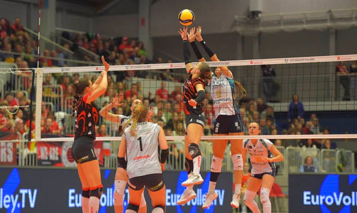 12 3 2026, Dresdens Emma Grome and behind her Chieris Sara Alberti at the net, Volleyball, CEV Cup, semi-final, Dresdner SC Reale Mutua Fenera Chieri, c Dresden