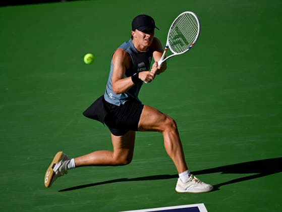 March 12, 2026 Iga Swiatek (POL) returns a shot against Elina Svitolina (UKR) during their quarterfinals match at the BNP Paribas Open held at the Indian Wells Tennis Garden in Indian Wells, California. California. Mandatory Photo Credit : CSM Indian Wells United States of America - ZUMAc04_ 20260312_zma_c04_177 Copyright: xCharlesxBausx