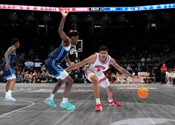 MAR 12 2026: Chris Cenac Jr. (5) looses control of the ball against BYU Cougars forward AJ Dybantsa in the Big 12 Championship Tournament at T-Mobile center, Kansas City, Missouri. CSM. NCAA, College League, USA Basketball 2026: BYU Vs Houston Big 12 Tournament  - ZUMAc04_ 20260312_zma_c04_230 Copyright: xJonxRobichaudx