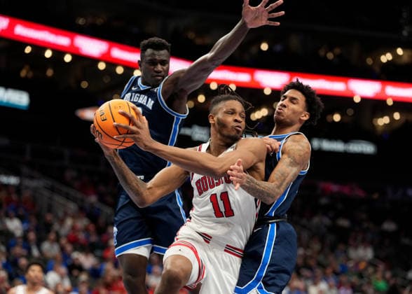 MAR 12 2026, Kansas City, Missouri, USA: Houston Cougars forward JOSEPH TUGLER (11) drives against BYU Cougars forward DOMINIQUE DIOMANDE (24) and BYU Cougars center KEBA KEITA (13) in the Big 12 Championship Tournament at T-Mobile center, Kansas City. Kansas City USA - ZUMAc04_ 20260312_zma_c04_226 Copyright: xJonxRobichaudx