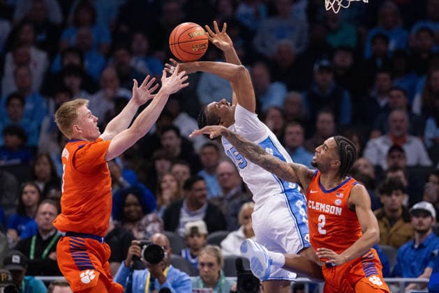 ACC Mens Basketball Championship: Clemson Vs UNC Mar 12 March 12, 2026: Clemson Tigers guard Efrem Johnson (4) fouls North Carolina Tar Heels forward Jarin Stevenson (15) during the first half of the 2026 ACC Men s Basketball Championship at Spectrum Center in Charlotte, NC. (Scott Kinser CSM) (Credit Image: Â Scott Kinser Cal Media) Charlotte Nc United States EDITORIAL USE ONLY Copyright: xx ZUMA-20260312_zma_c04_258.jpg ScottxKinserx csmphotothree479865