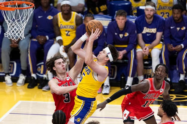March 12, 2026, Los Angeles, California, USA: Los Angeles LakersÃ¢â‚¬â ¢ Austin Reaves (15) shoots against Chicago BullsÃ¢â‚¬â ¢ Josh Giddey (3) during an NBA, Basketball Herren, USA basketball game at Crypto.com Arena on Thursday, March 12, 2026 in Los Angeles. NBA 2026: Bulls Vs Lakers  - ZUMAc68_ 20260312_zaf_c68_063 Copyright: xRingoxChiux