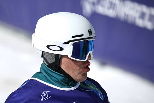 ITALY, CORTINA D AMPEZZO - MARCH 13, 2026: Dmitry Fadeyev of Russia competes in the men s banked slalom SB-LL1 final during the 2026 Winter Paralympic Games at the Tofane Alpine Skiing Centre. Mikhail Tereshchenko TASS  89964372