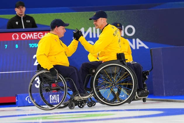 CORTINA, ITALIEN 20260313 Sveriges Marcus Holm och Viljo Petersson Dahl, under semifinalen i curling mixad mellan Kina och Sverige i Paralympics pa Cortina Curling Olympic Stadium. *** Bilden ingar i SPORTPAKET. För övriga BETALBILD *** CORTINA ITALIEN x10500x *** CORTINA, ITALY 20260313 Swedens Marcus Holm and Viljo Petersson Dahl, during the mixed curling semi-final between China and Sweden in the Paralympics at the Cortina Curling Olympic Stadium Picture in SPORT PACKAGE For others PAY PICTURE CORTINA ITALY x10500x  Copyright: xMagnusxLejhall ParasportxSverige TT TTx PARALYMPICS 2026 CURLING
