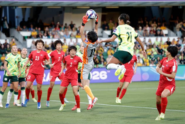 SOCCER ASIAN CUP MATILDAS DPR KOREA, Yu Son-Gum of North Korea makes a save under pressure from Mary Fowler of Australia during the AFC Women™s Asian Cup Quarter Final match between Australia and Democratic People s Republic of Korea (DPR) at HBF Park in Perth, Friday, March 13, 2026. ( NO ARCHIVING, EDITORIAL USE ONLY PERTH WESTERN AUSTRALIA AUSTRALIA  Copyright: xRICHARDxWAINWRIGHTx 20260313145930409810