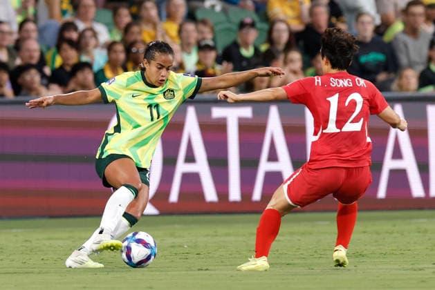 SOCCER ASIAN CUP MATILDAS DPR KOREA, Mary Fowler of Australia under pressure from Hong Song-Ok of North Korea during the AFC Women™s Asian Cup Quarter Final match between Australia and Democratic People s Republic of Korea (DPR) at HBF Park in Perth, Friday, March 13, 2026. ( NO ARCHIVING, EDITORIAL USE ONLY PERTH WESTERN AUSTRALIA AUSTRALIA  Copyright: xRICHARDxWAINWRIGHTx 20260313117745942844
