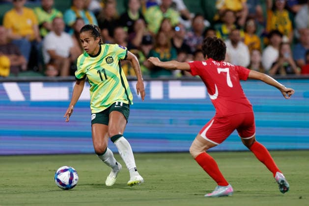 SOCCER ASIAN CUP MATILDAS DPR KOREA, Mary Fowler of Australia under pressure from Myong Yu-Jong of North Korea during the AFC Women™s Asian Cup Quarter Final match between Australia and Democratic People s Republic of Korea (DPR) at HBF Park in Perth, Friday, March 13, 2026. ( NO ARCHIVING, EDITORIAL USE ONLY PERTH WESTERN AUSTRALIA AUSTRALIA  Copyright: xRICHARDxWAINWRIGHTx 20260313178778157460