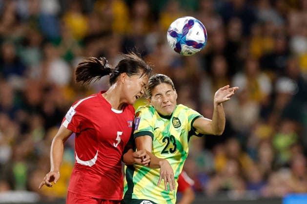 SOCCER ASIAN CUP MATILDAS DPR KOREA, Kyra Cooney-Cross of Australia and An Kuk-hyang of North Korea compete for the ball during the AFC Women™s Asian Cup Quarter Final match between Australia and Democratic People s Republic of Korea (DPR) at HBF Park in Perth, Friday, March 13, 2026. ( NO ARCHIVING, EDITORIAL USE ONLY PERTH WESTERN AUSTRALIA AUSTRALIA  Copyright: xRICHARDxWAINWRIGHTx 20260313129674828946