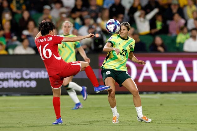 SOCCER ASIAN CUP MATILDAS DPR KOREA, Kyra Cooney-Cross of Australia and Song Chun-Sim of North Korea compete for the ball during the AFC Women™s Asian Cup Quarter Final match between Australia and Democratic People s Republic of Korea (DPR) at HBF Park in Perth, Friday, March 13, 2026. ( NO ARCHIVING, EDITORIAL USE ONLY PERTH WESTERN AUSTRALIA AUSTRALIA  Copyright: xRICHARDxWAINWRIGHTx 20260313123723222677