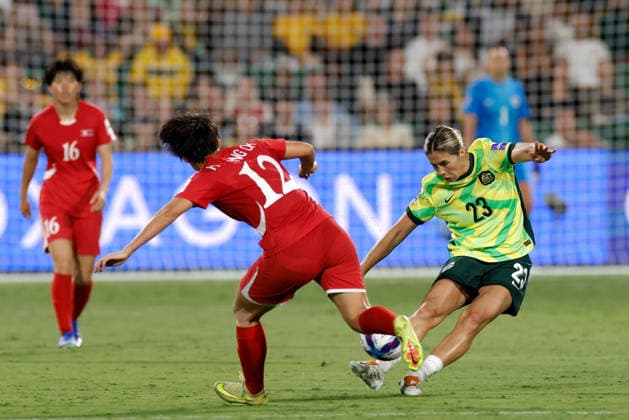 SOCCER ASIAN CUP MATILDAS DPR KOREA, Kyra Cooney-Cross of Australia and Hong Song-Ok of North Korea compete for the ball during the AFC Women™s Asian Cup Quarter Final match between Australia and Democratic People s Republic of Korea (DPR) at HBF Park in Perth, Friday, March 13, 2026. ( NO ARCHIVING, EDITORIAL USE ONLY PERTH WESTERN AUSTRALIA AUSTRALIA  Copyright: xRICHARDxWAINWRIGHTx 20260313133124298218